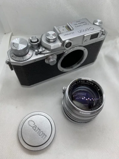 佳能IIB 仿徕卡，除了1秒不太正常其他功能正常，成色不错。50 1.8镜头内部有清理痕迹，细微划痕。