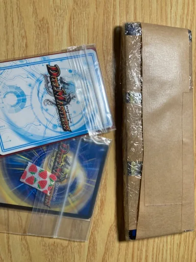 这次趁暑假挖煤姬搞活动，又买了一个卡组和几张单卡。用竹蜻蜓一周多点就到了，还是挺快的，东西都完好无损，很满意。