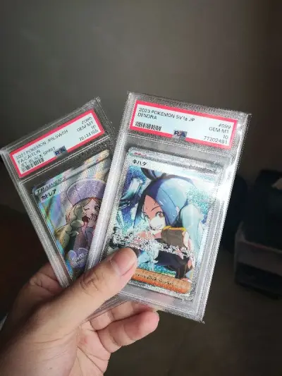 两张心爱的评级卡安全抵达，作为第一次购物体验，一开始还担心卖家发假卡或者货不对板什么的。没想到顺利到手，很激动！挖煤姬的包装服务也特别好，在箱子一半被压扁的情况下也安全到家，没有出现壳损情况，以后还会继续选择挖煤姬的