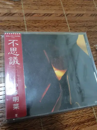 雅虎日拍我的超人。两张成色很好，d404me，这85年明菜花活好多，还有一张不思議主打一个听不清，难怪当时会被投诉，人折腾半天发现不是自己设备问题肯定会投诉的