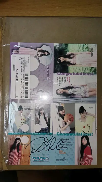 这回在骏河屋买了在假面骑士ooo里饰演泉比奈的高田里穗的签名 价格实惠发货非常快，包装结实，我非常满意
