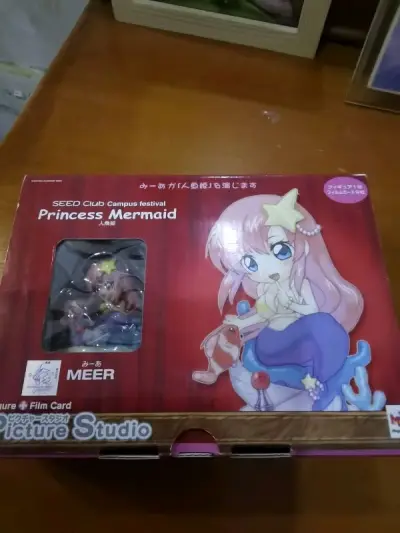 这次还是购买了高达SEED的周边，真的非常喜欢这个系列的产品，煤炉上面的卖家包装都很好，合单的后的运费平摊下来也不太贵，还收到了米娅的人鱼姬手办，外壳包装有点破损，里面没有什么大问题，合单后挖煤姬的包装也很到位，有泡沫纸保护，下次看到合适的继续下单