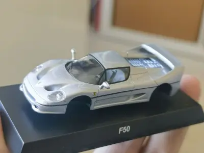 这次淘到全套第七弹京商kyosho法拉利合金车模，1/64比例中的精品，特别喜欢银色F50，漆面闪闪发亮，保存的很好。走航空件物流超快，好评！