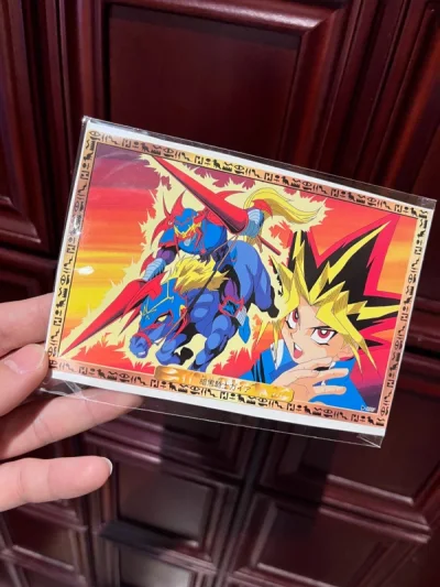 双十一的时候买的游戏王明信片，白菜价入的，可以说是捡到宝了，哈哈，这次选的竹蜻蜓，等得稍微久了，要等前面的包裹发货才能轮到这单，不过也值了，邮费很便宜！