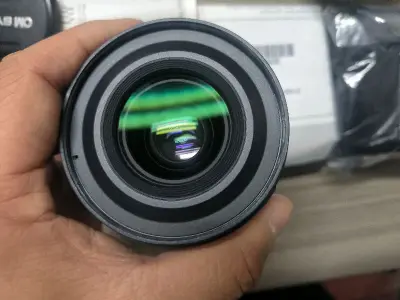 这颗奥林巴斯20mm f1.4成色非常棒。最近挖煤姬的发货速度确实超级慢。ems邮政空运到国内，还被海关抽查，最后重新申报，交税才寄到手。
