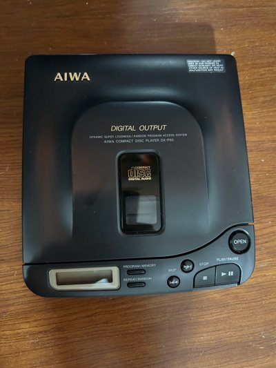 爱华AIWA DX-P50 CD机，关联DX-P10 P1

爱华AIWA DX-P50 CD机CD随身听，单机，整体成色不错，电池仓无漏液弹簧新净，外观请仔细看图；
各功能正常，光头型号KSS-220A，替换方便，光头状态很好，读盘切歌都很顺畅，光头湛蓝，视频里读...