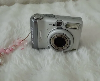 这一次又买了佳能的小面包机，特别开心超级幸运的呀！特别可爱，已经买到了很多这系列的了！拿到手包装依然很好！包装的很仔细！机子没有任何损坏！很满意