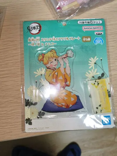 切煤好物分享！这次买到了善逸的花街立牌，可以凑成共鸣了。走的挖煤姬竹蜻蜓，没有被税的风险~整体物流速度和上次持平，正常通关后国内邮配送也很快！体验不错 