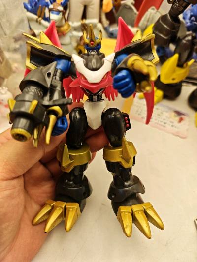 今天收到数码宝贝模型玩具帝皇龙甲兽模型玩具，没想到多年前的玩具还保存的这么好，哈哈，给力，挖煤姬一如既往地让人省心，给力。