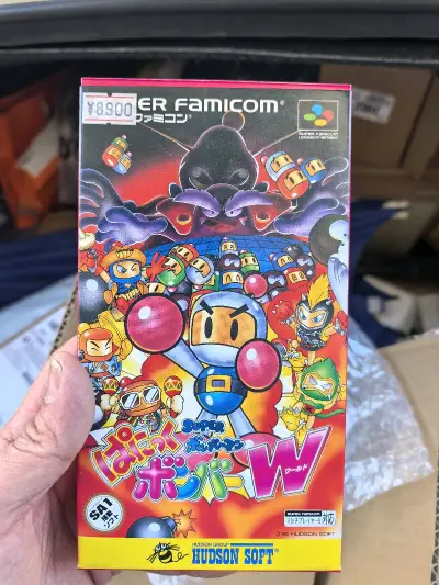 两张全新的sfc游戏，一张炸弹人，一张机器人大战，还有一张ps1的游戏。这次竹蜻蜓很快就到了，打包也非常的好！