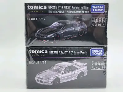 蹲了好久的Tomica Premium系列终于到手！这次从挖煤姬淘了两款日产GT-R限定款，拆开包裹的瞬间直接幸福感拉满✨
 
上层是日产GT-R NISMO Special edition，哑光黑车身搭配红黑撞色轮毂，1/62的比例把NISMO套件的凌厉感还原得超...