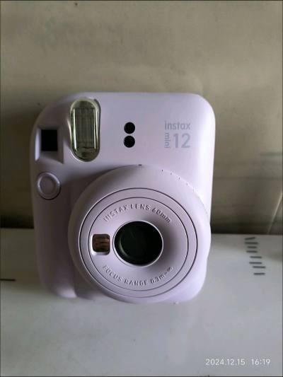 买了好多次海淘，第一次买拍立得mini12，带原包装，橙色还是很新的，选的是拼团物流这次，就算速度慢一点，总体还是满意的