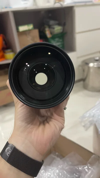 第一次使用挖煤姬买下了这个100-400apo，等了一个月终于到了，镜片都完好有些许灰尘，总体来说体验很好