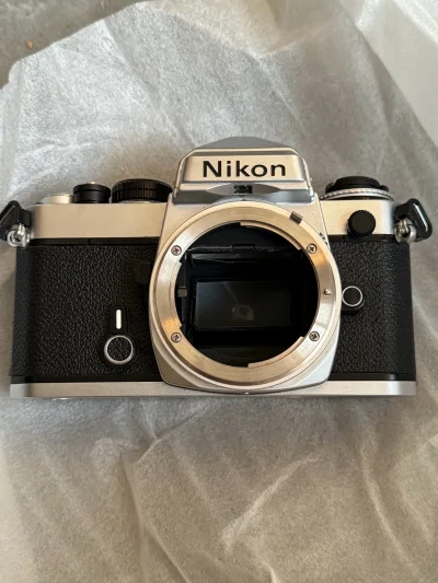 挖煤姬海淘的第四单  购买的尼康fe到手了 包装超级有心 成色也很新 这个外貌超级美丽 越看越喜欢 还用了挖煤姬的砍价服务 很好价的拿到手了 用的是小航空 用完积分兑换只花了个位数运费 不到一周就送达了 超级快 狠狠安利挖煤姬