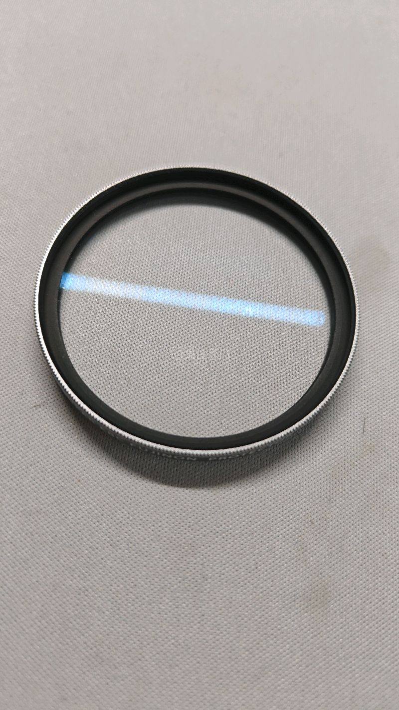 买了uv镜，富士ebc镀膜通透明亮，有擦拭痕迹但影响不大。装在相机上效果好，几乎不影响画质。任意门软件操作方便，体验很好。