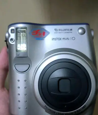 这次买了两台初代老型号的拍立得mini10，功能测试都是正常没问题的，还有一台尼康ccd，但是电池没电了