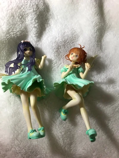 在挖煤姬淘的年末好物分享《魔卡少女樱》小樱与知世的绿裙景品手办，这是充满乐趣的“挖宝”过程。这类经典动漫的景品手办在日拍中古市场比较常见，是满满的童年回忆。是 《魔卡少女樱》动画中经典的“绿裙合唱服”造型。在动画“合唱比赛”等剧情里，小樱和知世都穿过这套优雅的绿色连...