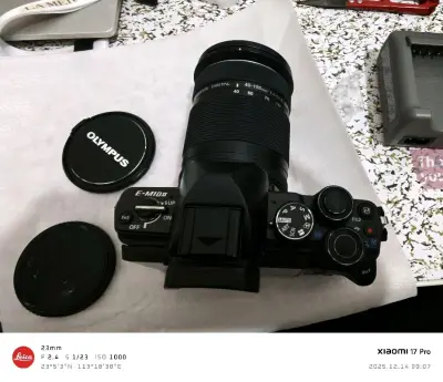 第一次淘微单，在挖煤姬上面，比国内会便宜很多，但同时也会有很多风险。很幸运，这次淘到的奥林巴斯em 102功能都是好的，成色也比图片要新，就是包装比较简陋，还好送到没有问题，卖家附赠的是一个长焦镜头，拿到手之后立马试了一下拍摄效果还可以