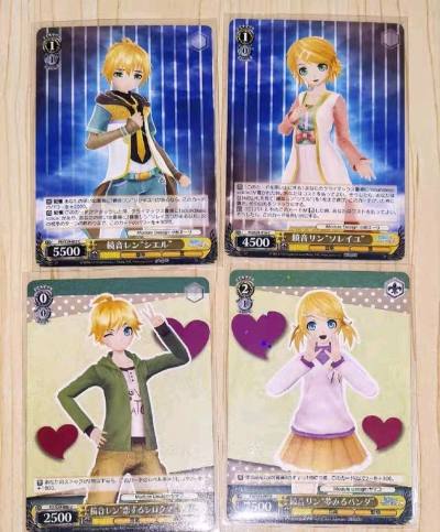 终于买到镜音双子的金签卡，凑岛内又买了其他的几种黑白双翼卡，挖煤姬的拼团功能很方便，跟团走国际物流相比一个人更省运费！