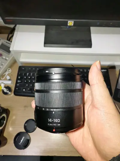 松下14-140，天涯头实用性很高，外观很新，非常滴棒?。搭配松下机身可以协同防抖。竹蜻蜓还是很好用的，日淘就用挖煤姬，嘿嘿。