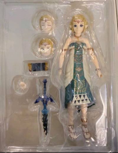 figma塞尔达做工精良，高度还原游戏造型，面部神态、服饰纹理与配色精准细腻，质感在线。关节设计合理、可动性强，能轻松摆出多种经典姿势，把玩与摆柜都合适。配件丰富、替换顺畅，涂装干净无溢色，比例协调、整体质感扎实，兼顾收藏与可玩性，是塞尔达爱好者值得入手的优质可动手...figma塞尔达做工精良，高度还原游戏造型，面部神态、服饰纹理与配色精准细腻，质感在线。关节设计合理、可动性强，能轻松摆出多种经典姿势，把玩与摆柜都合适。配件丰富、替换顺畅，涂装干净无溢色，比例协调、整体质感扎实，兼顾收藏与可玩性，是塞尔