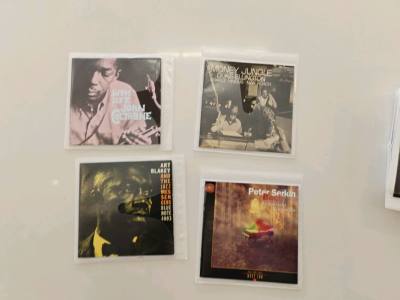 这一单是卖家批量出售的无外盒包装版，没说具体数量，只说100张左右，标题是爵士入门名盘，到仓库显示有5斤左右，由于价格低被要求重新申报，好在顺利通过，收到以后数了下，足足有180张，基本都是爵士名盘，还有几十张古典，填补了我没什么古典专辑的空白，唯一遗憾的一点就是卖...这一单是卖家批量出售的无外盒包装版，没说具体数量，只说100张左右，标题是爵士入门名盘，到仓库显示有5斤左右，由于价格低被要求重新申报，好在顺利通过，收到以后数了下，足足有180张，基本都是爵士名盘，还有几十张古典，填补了我没什么古典专辑