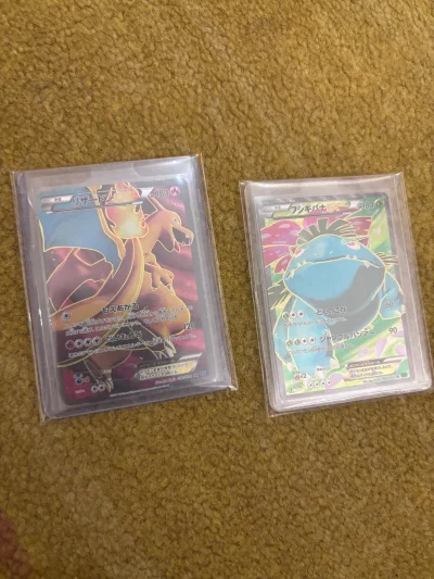 这两张卡 我看了好久了 终于降价 赶上好的优惠卷 顺利拿下 今天终于到我手里面了 很开心！我自己还有一张水箭龟 正好送个三连评级