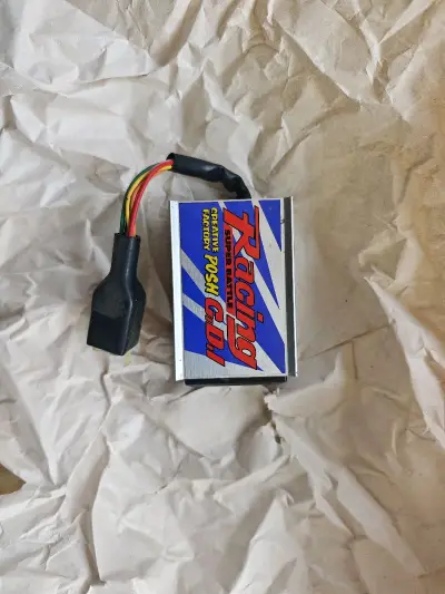 本田dio zx35期posh点火器，点火电力输出稳定，有效提升原车动力，解决原厂限速问题，整体成色很新，包装原好