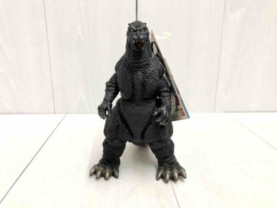 这款经典哥斯拉软胶通体哑光黑灰质感，背鳍与尾脊做蓝灰渐变处理，鳞片纹理细密立体，姿态沉稳威严，是还原度极高的复古收藏款。
