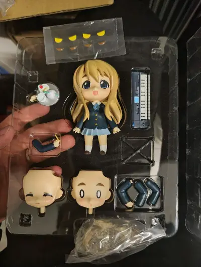 这次买的是轻音少女的手办，也是合单发的海运 运费都用积分抵扣了，基本国际运费0元购。挖煤姬也是用了很久了，很好用，方便筛选物品，切煤速度快。优惠活动比较多 经常能有好价