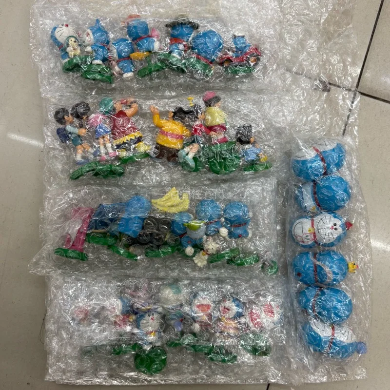 收到的蜡笔小新和哆啦A梦周边太可爱了！实物和图片完全一致，每个小挂件、小玩偶做工都很精致，没有瑕疵。打包特别用心，裹了多层泡沫纸，运输途中一点没损坏。挖煤姬下单流程顺畅，物流也很快，满满一大包幸福感爆棚，非常满意！