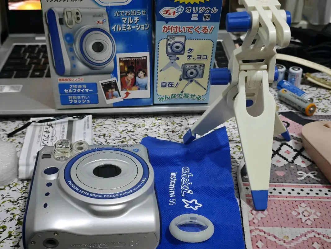 mini55和专用支架，这个性价比很高，除了没有自拍镜这个以为，其他的支架孔定时拍摄功能都有，而且还有跑马灯视觉效果很好，但是感觉没有50s的颜值高。