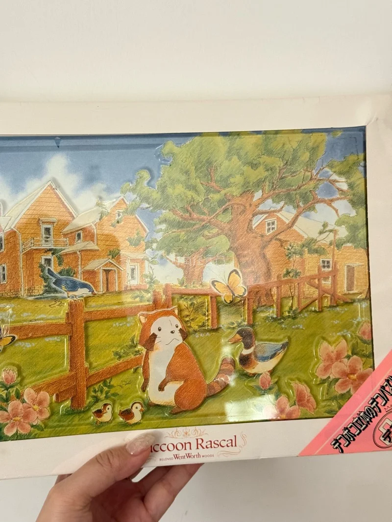 今天收到了一箱竹蜻蜓，里面有两幅小浣熊的图！一副是300片的圣诞礼物～还有一副是500的立体图，是鸭子栅栏～