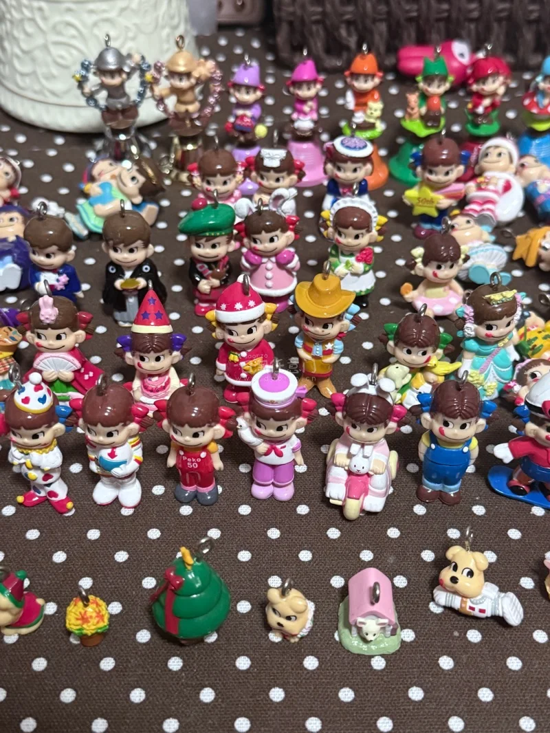 这次在挖煤姬挖到的不二家牛奶妹中古铃铛挂件，直接把踏春氛围感拉满。每只Peko酱都有专属造型，细节满满，是独有的温柔质感！最戳我的是，好几只都藏着铃铛，轻轻一晃，就是音色各不相同的清脆声响，走在风里，每一步都带着春天的旋律～挖煤姬打包超稳，到手成色完好无损，铃铛音色...