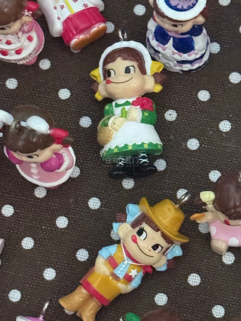 这次在挖煤姬挖到的不二家牛奶妹中古铃铛挂件，直接把踏春氛围感拉满。每只Peko酱都有专属造型，细节满满，是独有的温柔质感！最戳我的是，好几只都藏着铃铛，轻轻一晃，就是音色各不相同的清脆声响，走在风里，每一步都带着春天的旋律～挖煤姬打包超稳，到手成色完好无损，铃铛音色...