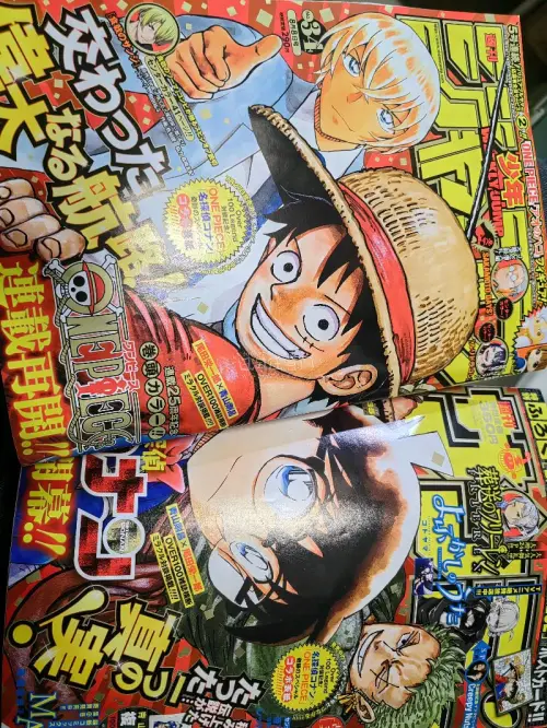 切了两本厚厚的jump漫＋薄本画集，画集薄薄用了厚硬单封袋装着了。书籍完全无撞角！打包特别厚实，虽然小杯垫用的是塑料亚克力做的但还是被厚气泡纸打包了，拆的时候居然拆出了一身汗。箱子很大填充物相当安全！