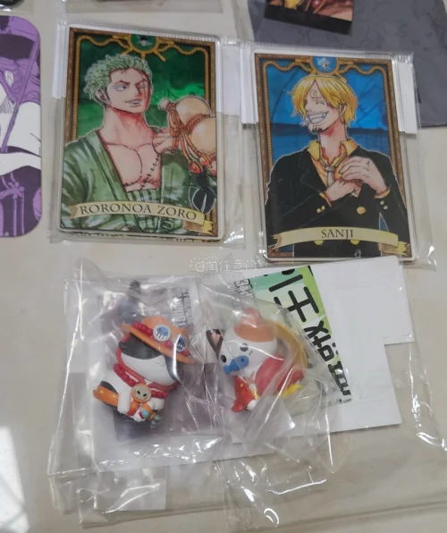 这次分享的是切的海贼王的谷子。数据卡和小喵是中古店切的，品相很好很满意。这次走的是EMS路线，合单审核很快，发货运输清关也很快，只要几天就到国内了。很满意的一次切煤。