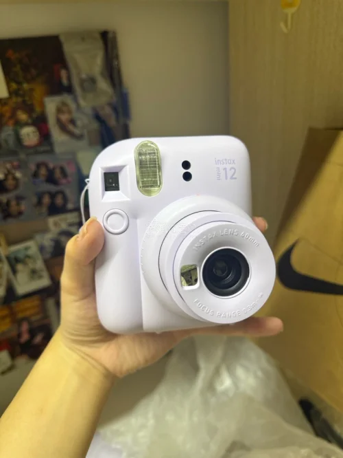 很漂亮的mini12，还带了17张相纸。310块钱的价格拿下，本来以为要被税了结果轻轻松松过关诶～
运费花了5块钱，喜欢挖煤姬的积分抵扣～超划算